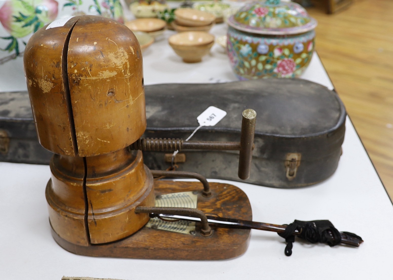 A milliner's hat stretcher and lorgnette